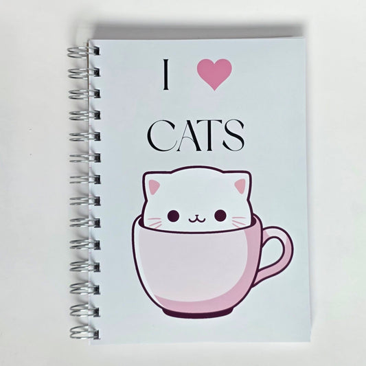 Cute cat notebook with “I Love Cats” text and white cartoon cat in pink teacup on glossy cover